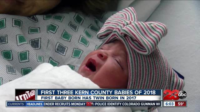 The first baby born in 2018 has a twin born in 2017