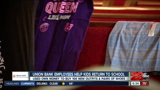 Local bank employees get kids excited for...