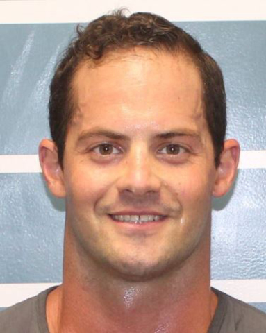 Former KCSO deputy turns himself in